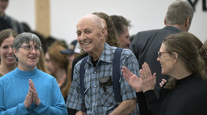 Bill Robinson (middle) is all smiles with his daughter Lorraine Moet (left) and Lakeland College President and CEO Dr. Alice Wainwright-Stewart (right).