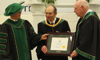 Don Mazankowski receiving distinguished citizen plaque